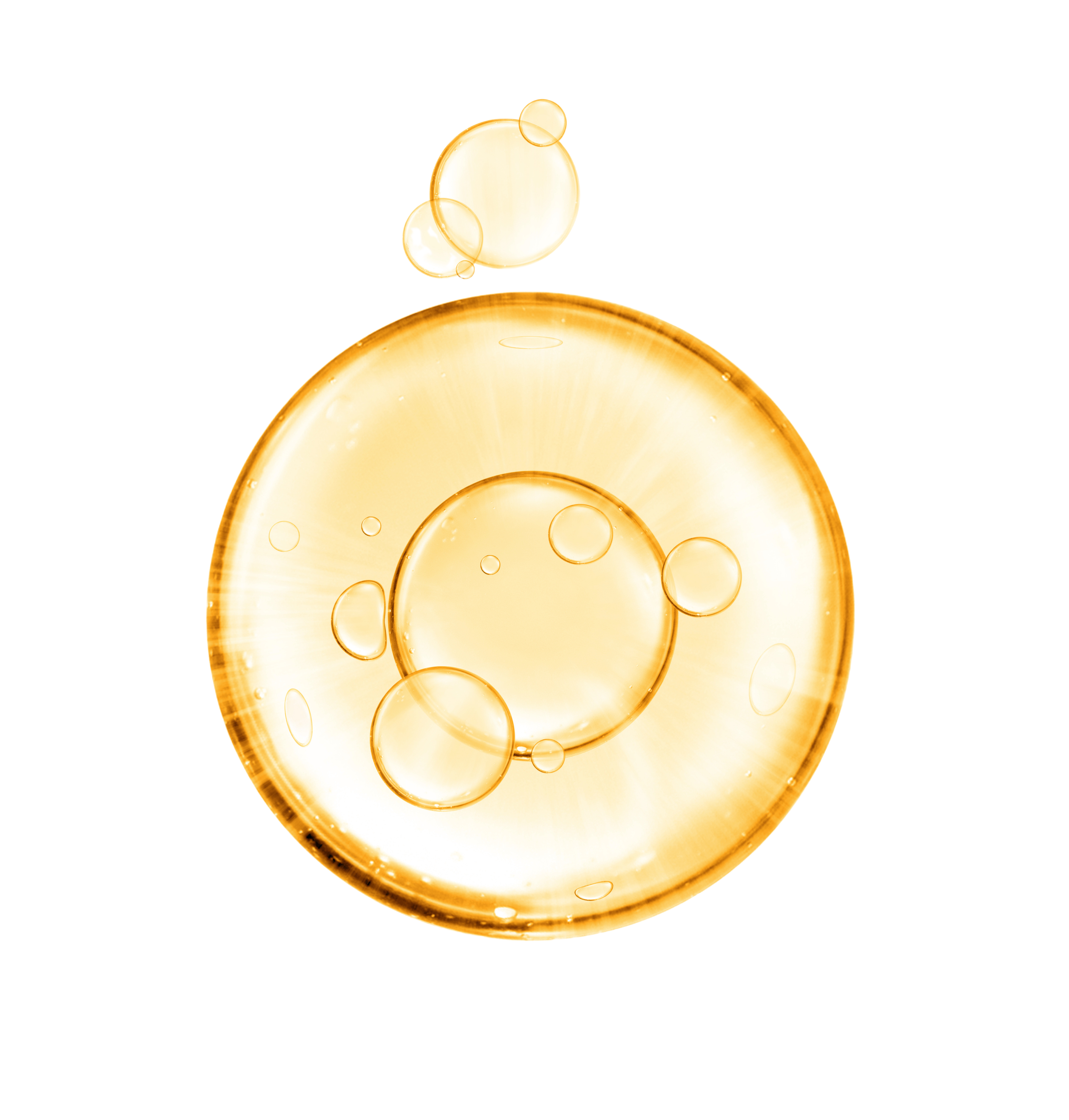 Een transparante, gouden bel met kleinere belletjes drijft in een heldere vloeistof tegen een zwarte achtergrond.
